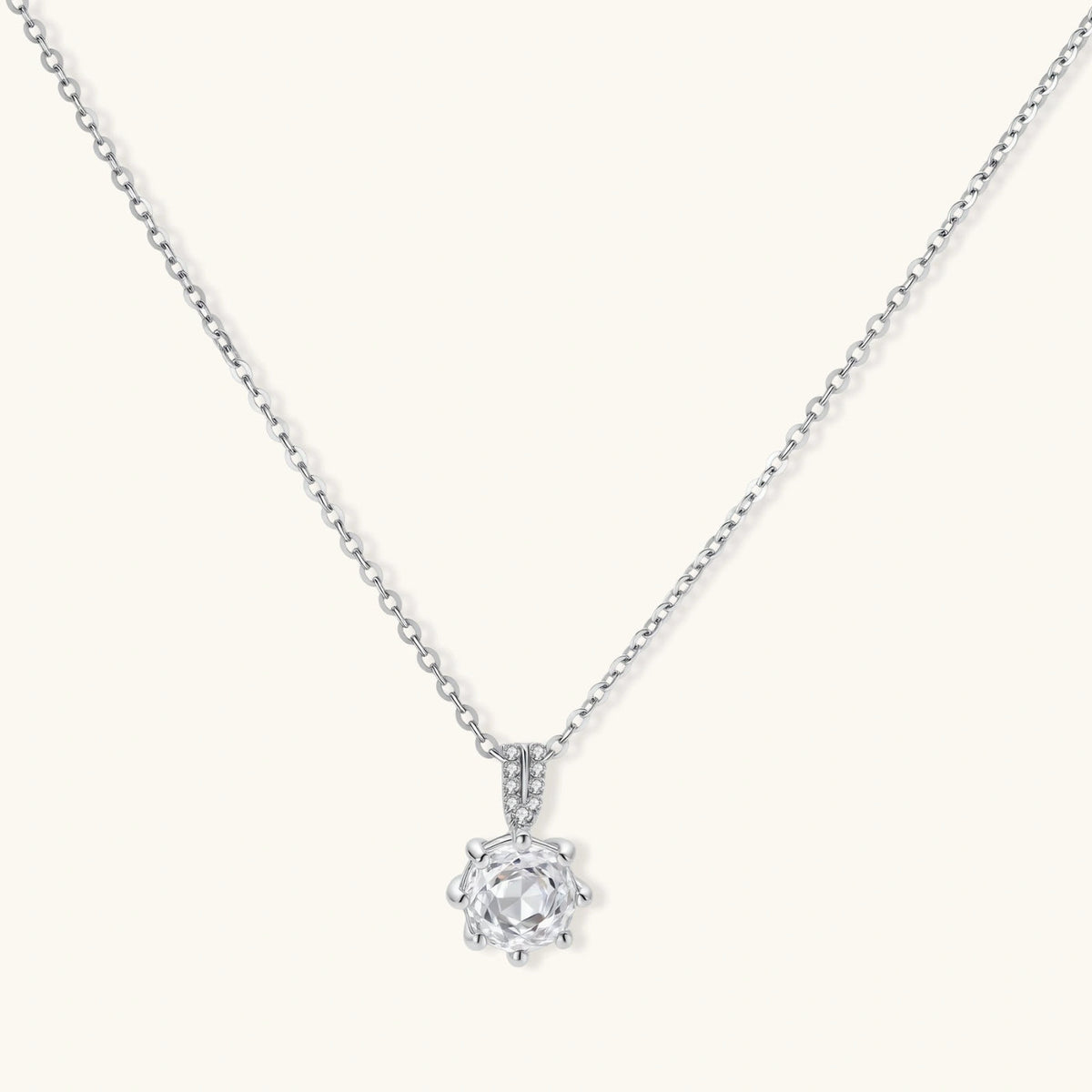 Crystal Clarity Pendant necklaces photographed for VENIER on a warm ivory product set