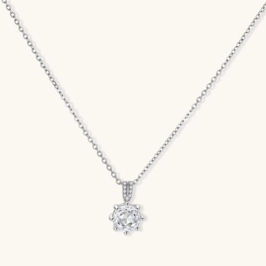 Crystal Clarity Pendant necklaces photographed for VENIER on a warm ivory product set