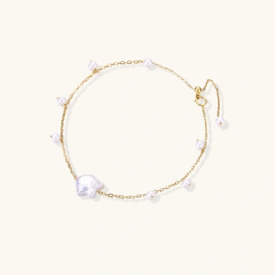Baroque Pearl Bracelet bracelets photographed for VENIER on a warm ivory product set