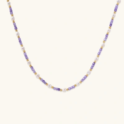 Lavender Pearl Beaded Necklace necklaces photographed for VENIER on a warm ivory product set