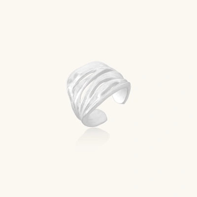 Wave Whisper Ring rings photographed for VENIER on a warm ivory product set