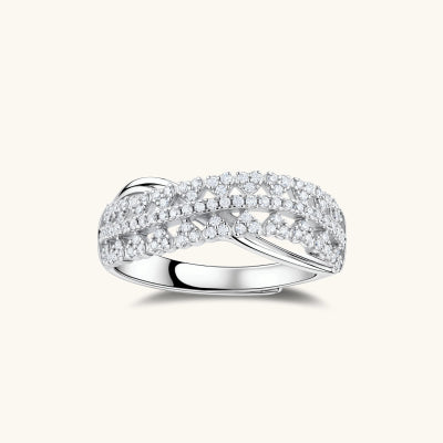 Infinity Crossover Ring rings photographed for VENIER on a warm ivory product set
