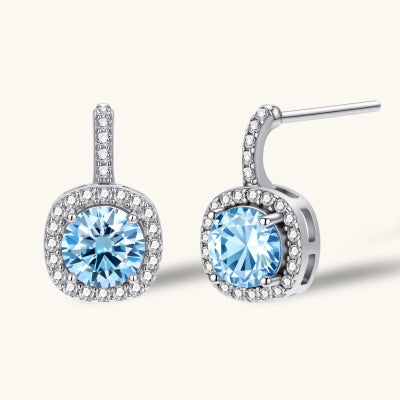 Celestial Halo Drops earrings photographed for VENIER on a warm ivory product set