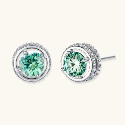 Green Moissanite Halo Studs earrings photographed for VENIER on a warm ivory product set