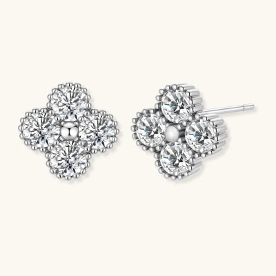 Quatrefoil Moissanite Studs earrings photographed for VENIER on a warm ivory product set