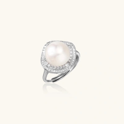 Pearl Halo Ring rings photographed for VENIER on a warm ivory product set