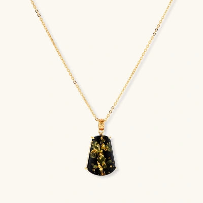Forest Gold Amber Set necklaces photographed for VENIER on a warm ivory product set