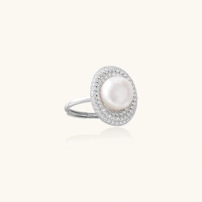 Moonlit Halo Ring rings photographed for VENIER on a warm ivory product set